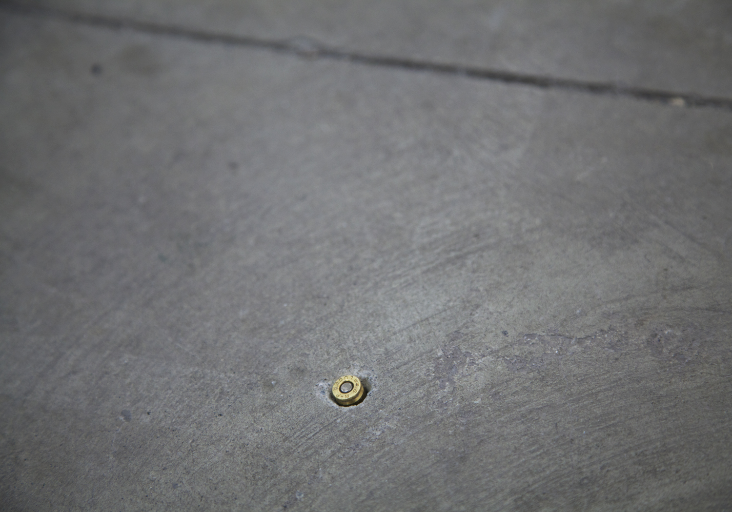Bull's Eye, "Trilogy (o)", (9mm Bullet embedded in gallery floor) 2012